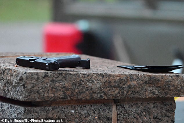 A gun was found at the scene in the Manhattan park on Sunday morning