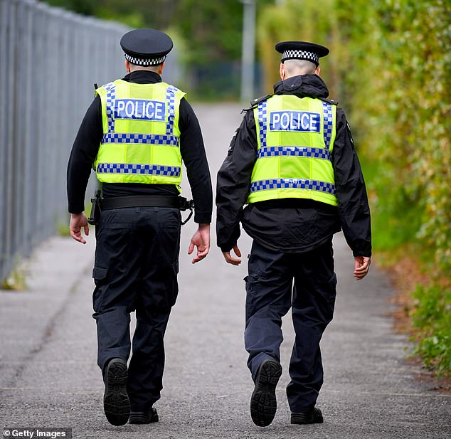 Police have arrested two men on suspicion of causing death by dangerous driving after another passenger was pronounced dead at the scene (stock image of police)