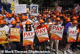 Despite recent pay rises, resident doctors are set to strike on Friday. Pictured: Junior doctors demonstrate opposite Downing Street in June last year