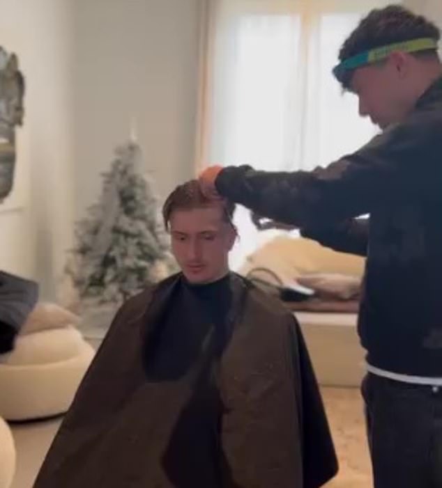 Cepeljac (right) also cut the hair of Mika Godts (left), who plays as a winger for Dutch side Ajax