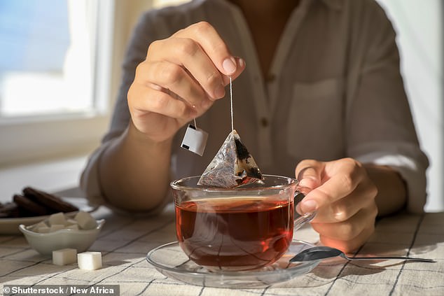 Experts say the best way to make a cup of tea is to pour boiling water over a teabag and leave it to steep for three to five minutes without stirring and then adding a splash of milk. Pictured: File photo