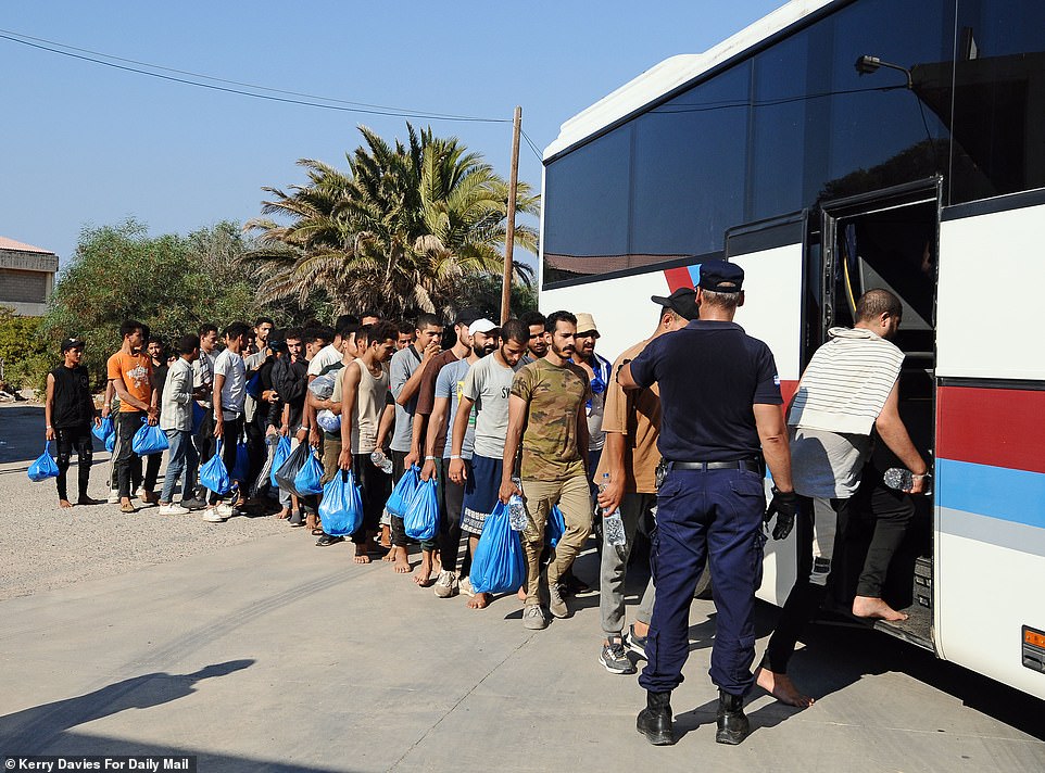 The migrants were shipped out on buses to the Knossos Palace ferry to Athens on Thursday evening