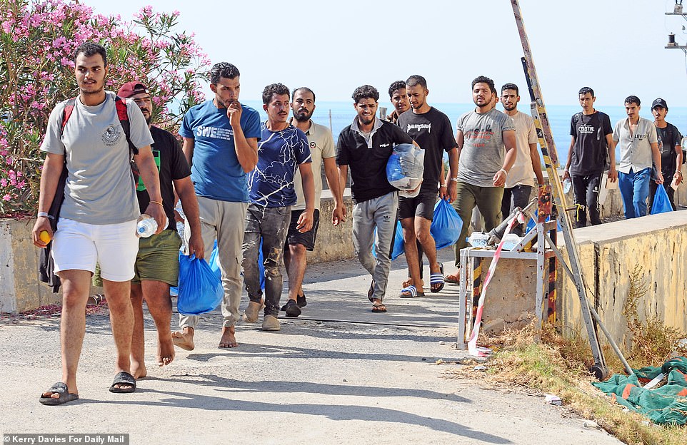 Hundreds of migrants were shipped to the Knossos Palace ferry as they look to try and reach Athens from Crete