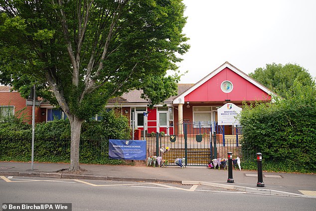 Floral tributes laid at Minehead Middle School in Minehead Somerset on Friday morning