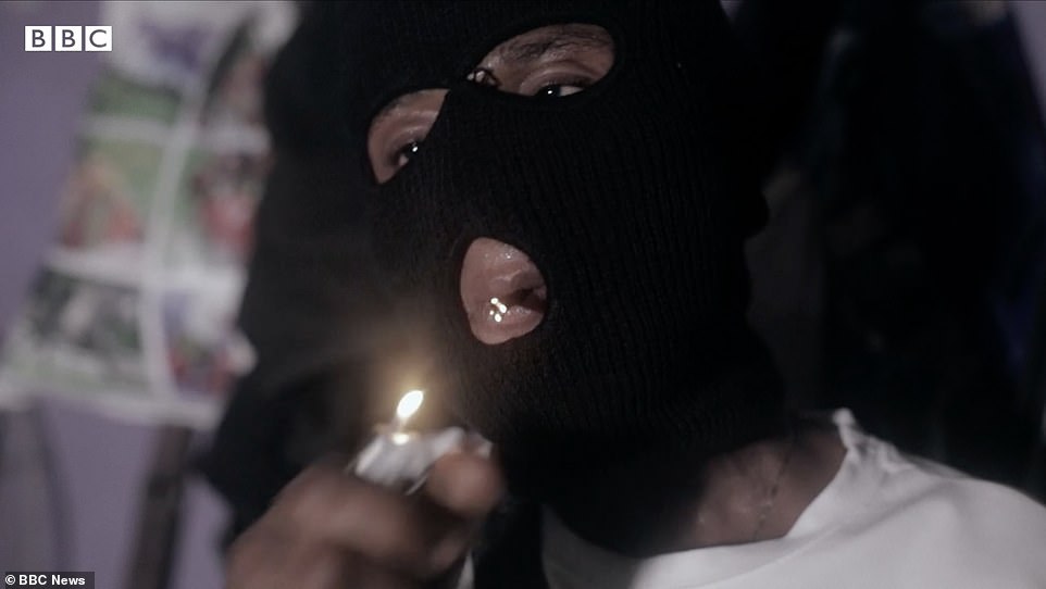 Bizarrely, the ultra violent Black Axe gang (pictured), whose secret rituals have seen it compared with a cult, started out as a university fraternity in Nigeria in the 1970s