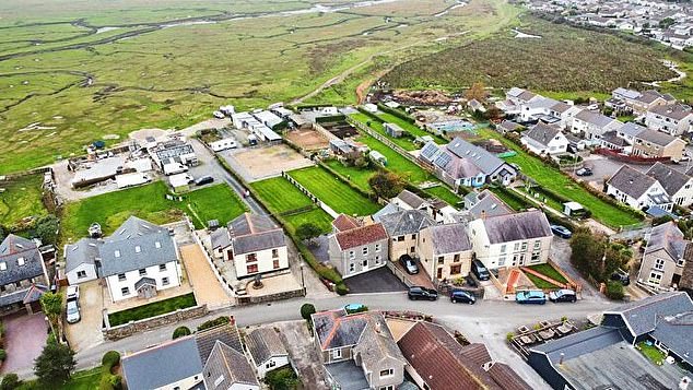 The distressing ordeal saw him march his naked friend through the centre of Penclawdd (pictured, file photo), down what is the main road through the whole north Gower area