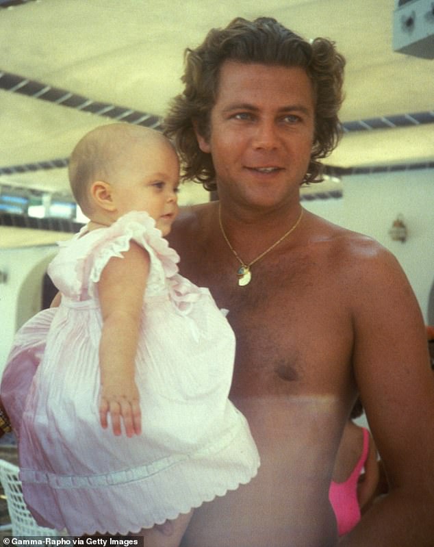 Athina is believed to have no contact with her father and has even dropped his last name (pictured together)