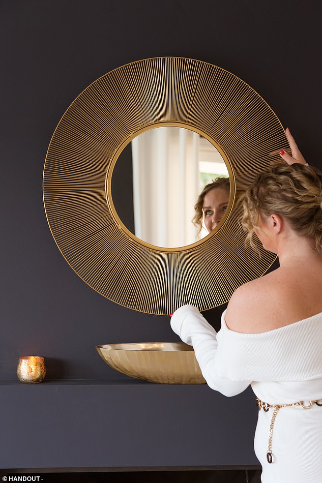 The property design guru says that sellers should aim to achieve a consistent interior theme throughout their property so that they can 'work in harmony rather than feeling disconnected'