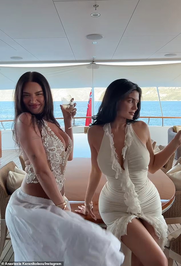 While in Kefalonia, Kylie and her gal pal Anastasia - who is of Greek descent - sipped on cocktails while cruising in a yacht