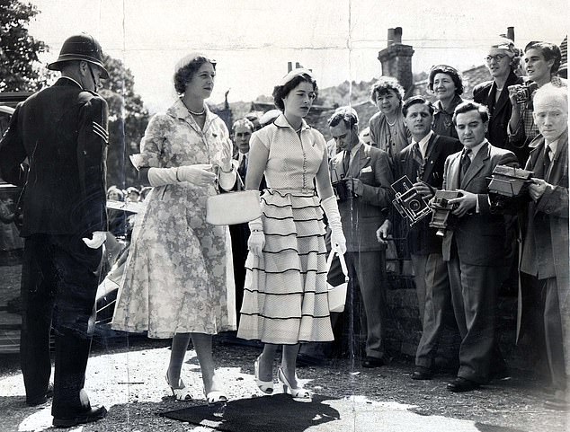 Princess Elizabeth arriving with Princess Alexandra of Kent for the wedding of the Hon Laura Smith to Mr Michael Brand
