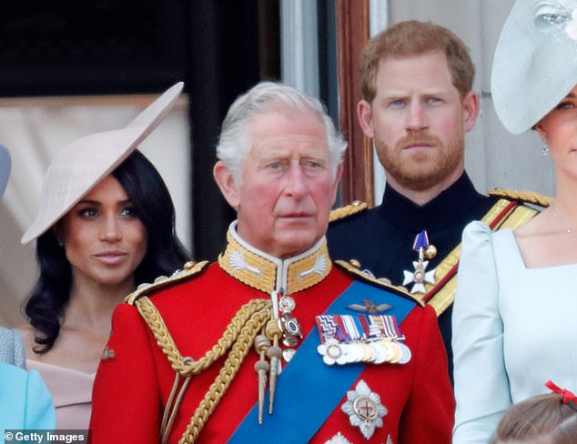 Seward wrote: 'The anger aimed at the monarchy, the British people, his father and stepmother was totally unnecessary.' Charles is pictured with Meghan and Harry in 2018