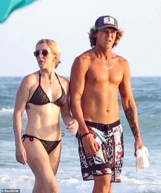 Ellie previously dated hunky surf instructor Armando Perez, 29, (pictured) with whom she sought comfort following the end of her marriage to younger husband Caspar Jopling, 33,