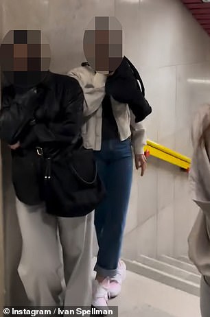 Young girls suspected of pickpocketing cover their faces in Venice