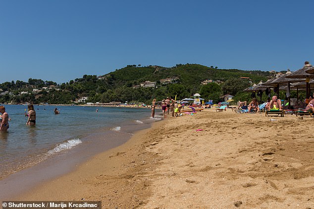 The British man was discovered at the spot in Agia Paraskevi, Siathos (pictured, file image), on June 20, with onlookers immediately alerting a lifeguard who was then able to provide first aid and call the emergency services.