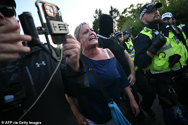 Protesters marching in Epping chanted in opposition to The Bell Hotel housing migrants