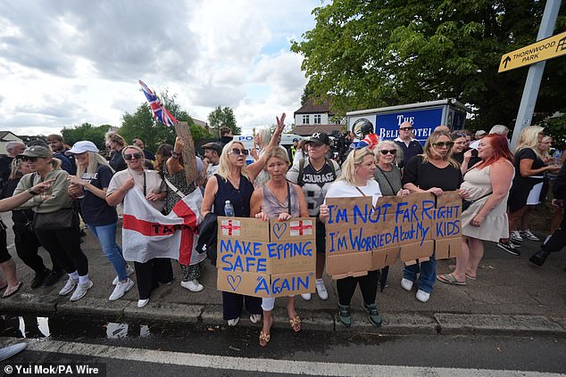 Protesters waved flags and signs as chants of 'save our kids' and 'send them home' rang out
