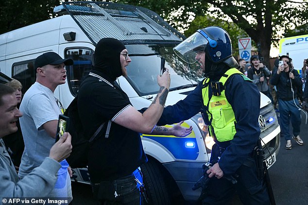 Protesters appeared to scuffle with police near the centre of Epping as people marched