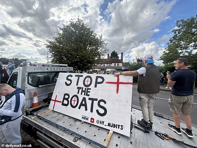 Another display called to 'Stop the Boats' with England flags between the O's and on either corner