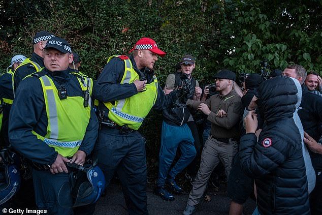 Officers were seen near crowds who had descended near the hotel for another day of protesting