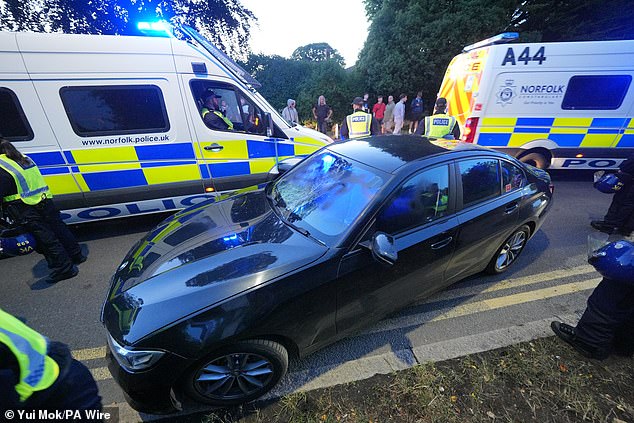A car, understood to be a police vehicle, was seen with a heavily damaged windscreen last night
