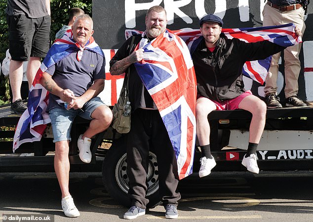 Protesters gathered outside the migrant hotel where a demonstration on Thursday descended into violent chaos