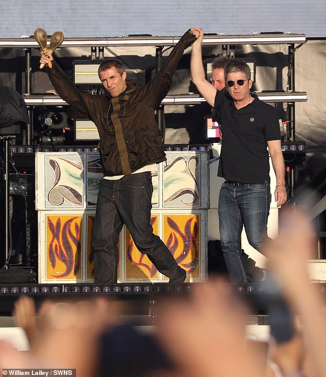 Liam and Noel Gallagher taking to the stage at Heaton Park on July 11 - the night before Mr Chapman went to see them perform