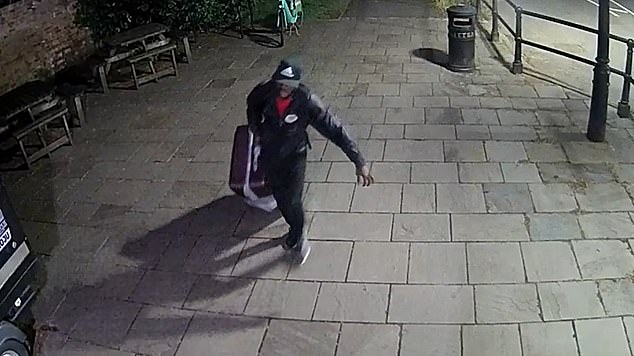 This is the chilling moment Yostin Andres Mosquera drags a suitcase containing human remains along to Clifton Suspension Bridge at 11.23pm on July 10