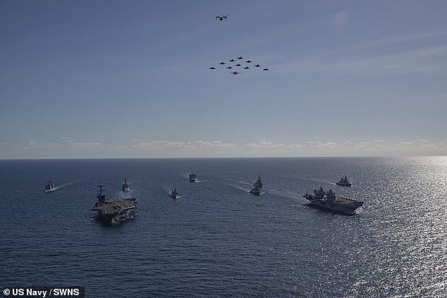 In April, the commander of the British-led carrier strike group insisted the Royal Navy stands ready to defy China - and that it is prepared for any sort of military operation. Commodore Blackmore said: 'I will deliver whatever mission I am ordered to go and do ¿ that's my role'