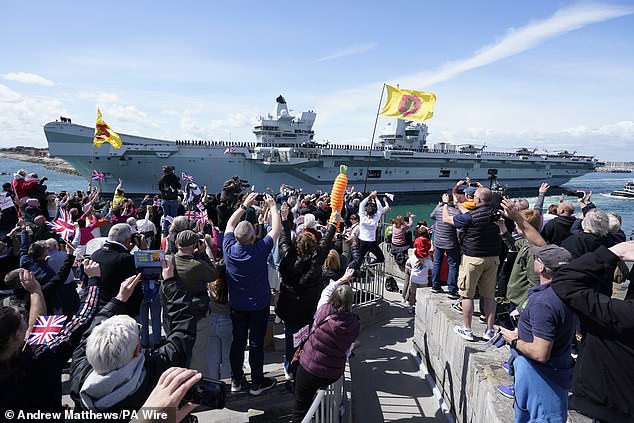 On April 22, crowds cheered as HMS Royal Prince of Wales departed her home of Portsmouth, alongside her escort ship, HMS Dauntless. Banners and flags were waved by members of the public from the walls and beach of Portsmouth harbour