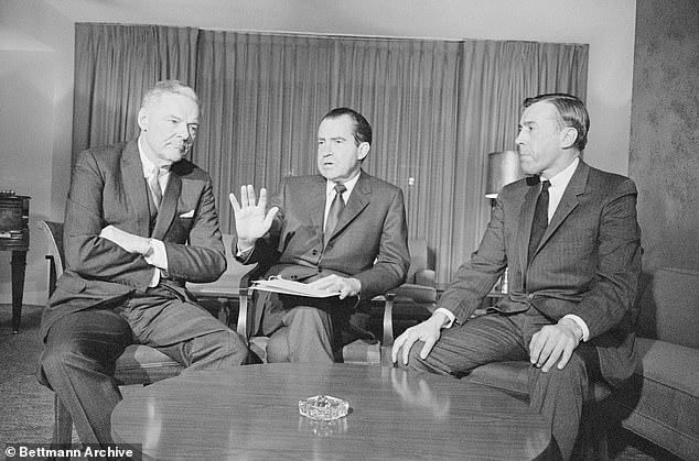 President elect Richard M. Nixon (c) confers with Henry Cabot Lodge Jr (l), his chief Vietnam peace negotiator, and Lawrence E. Walsh, the former Deputy Attorney General designated by Nixon as the No. 2 man at the Paris negotiations in January 1969