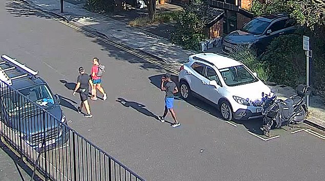 June 29: Mosquera (right) is seen leaving the Scotts Road flat with Mr Longworth (left) and Mr Alfonso (centre). They went for a trip to Brighton