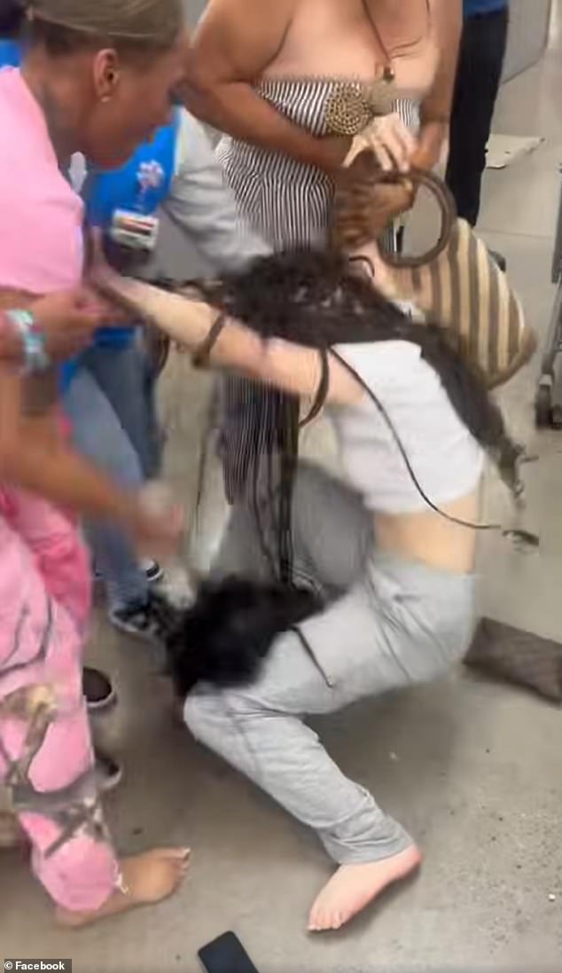 The woman said Tankard approached her from behind and grabbed her hair while she was using the self-checkout lane