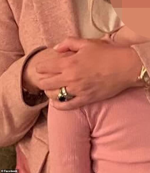 In one photo from Andrew's daughters 25th birthday party that was posted on social media in April of last year, a wedding ring is seen on Kristin's ring (pictured)