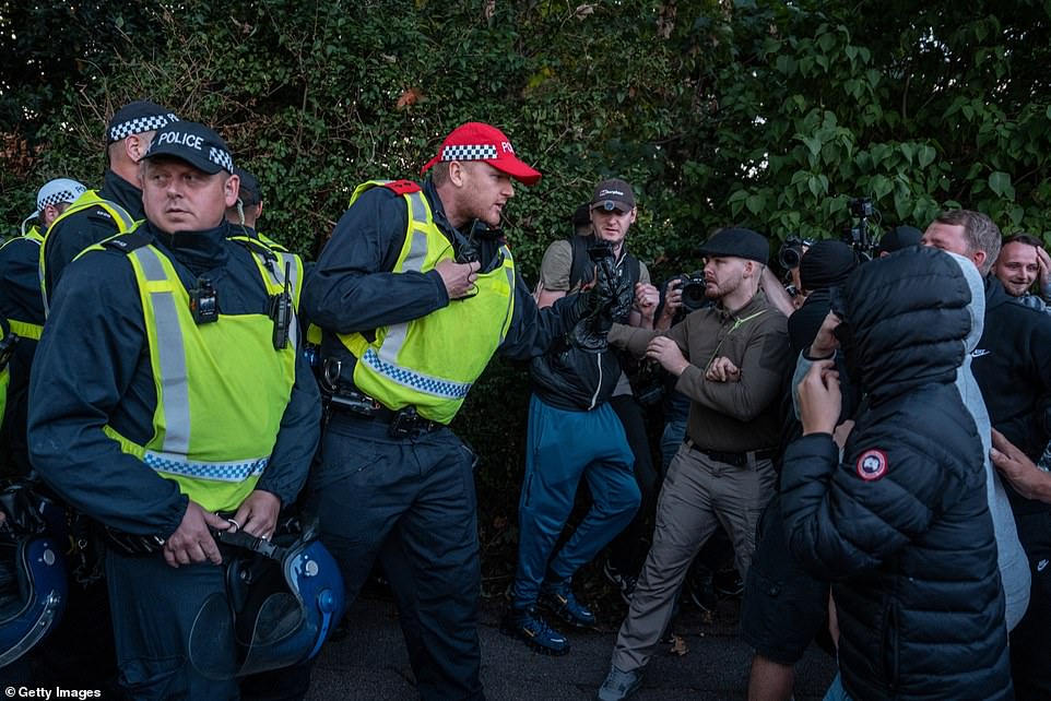 Protestors were seen outside the hotel near Essex on Sunday scuffling with police in the area