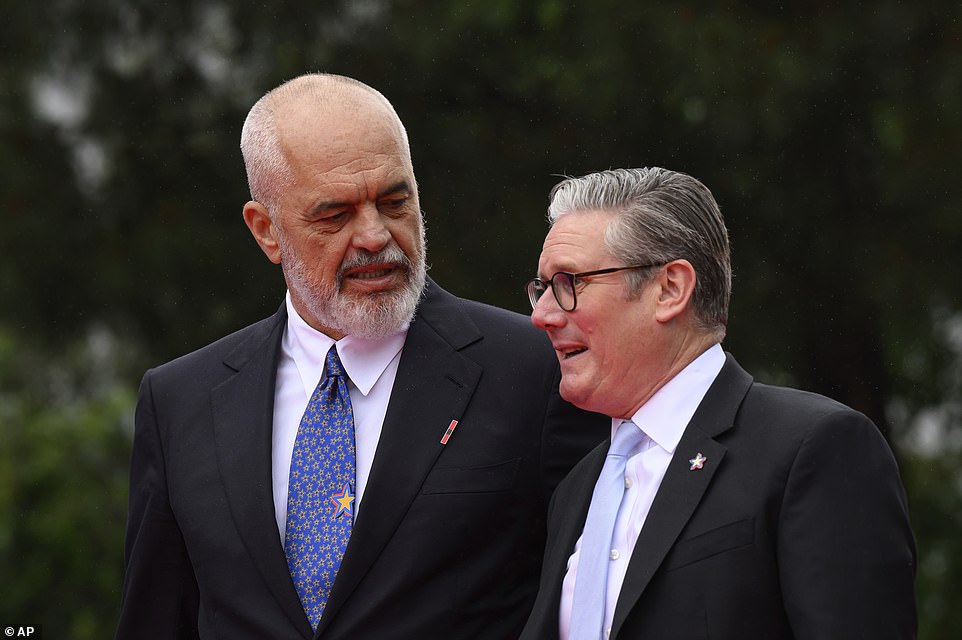 Mr Farage said the 10,000 foreign prisoners currently serving time in English jails would be deported and claimed he was already in talks with Albanian prime minister Edi Rama (left) about taking back his country's criminals