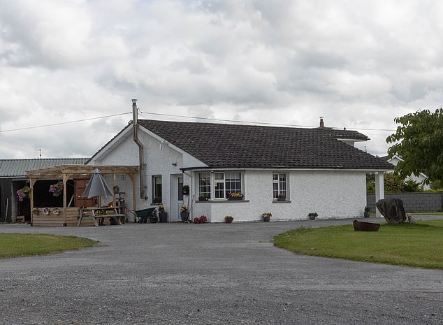 Joe's farmhouse (above) sits at the heart of the farm in the rural village of Screggan, a sleepy, forgotten backwater in Co Offaly