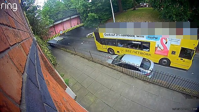 Distressed bypassers in their vehicles were seen quickly slamming the brakes, likely in disbelief at what they had just witnessed, as the large yellow bus left a trail of scattered glass and the roof in its wake