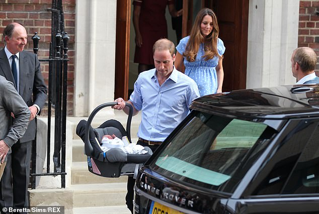 William carries George in a baby carrier to a car waiting for them outside the hospital