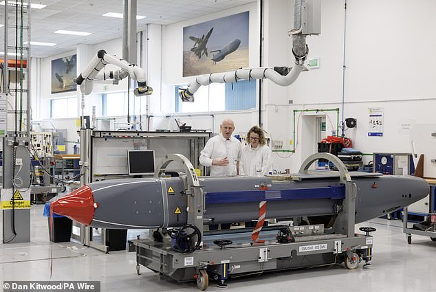 Defence Secretary John Healey is pictured observing a storm shadow missile on an assembly line at the MBDA Storm Shadow factory in Stevenage