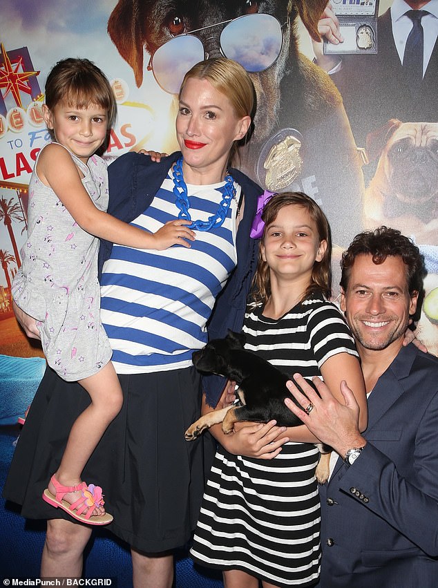 Evans and the girls did eventually find a place to live in the end with rent just under $3,000 a month but they are having to move schools because they are no longer in the district for their old one [Alice and Ioan with their daughters in 2018]