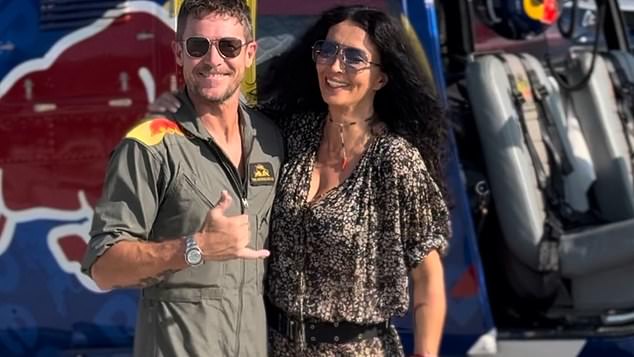 Baumgartner was holidaying with partner Michela Radulescu (picture, right)