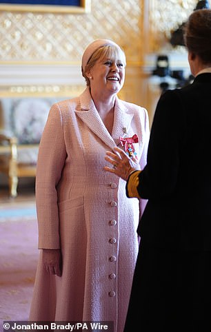 The actress beamed as she was made a Commander of the Order of the British Empire by the Princess Royal