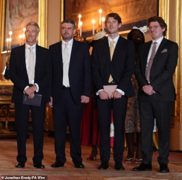 Salmon (far left) beamed with pride while attending the ceremony at Windsor Castle