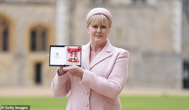 Lancashire showed off her CBE for onlookers outside Windsor Castle on Tuesday afternoon