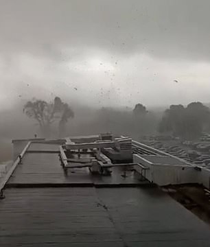 Shocking footage snapped by airport workers in Tours, France, showed a tornado ripping past the concourse