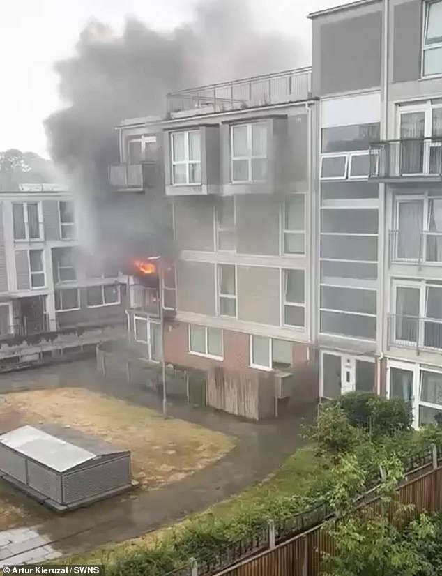 As the building went up in flames, concerned residents in a neighbouring block told people to 'get out' and warned them the e-bike 'can explode anytime'