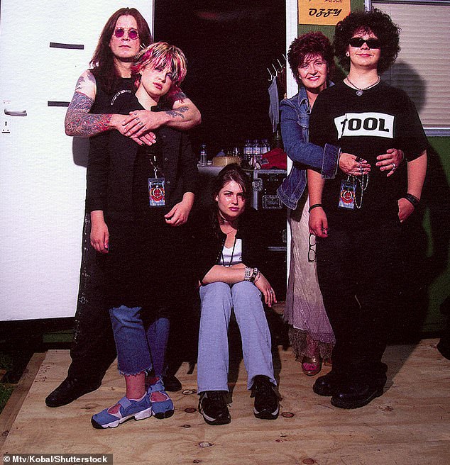 Osbourne with daughters Kelly and Aimee, wife Sharon and son Jack in 2002 - the year that the family's show The Osbournes began