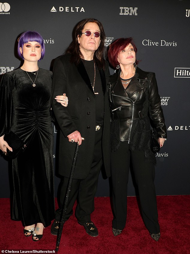 Osbourne and Sharon turned themselves and their children into TV stars with their documentary The Osbournes. Above: The singer with Sharon and Kelly in 2020