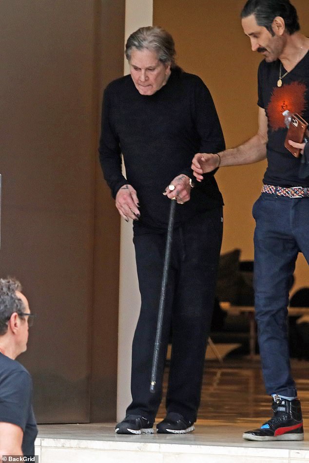 The frail star is pictured in May 2022 shortly before he went into hospital for his major back operation
