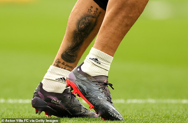 Emi Martinez wore customised boots inspired by Osbourne and Black Sabbath against Tottenham in November